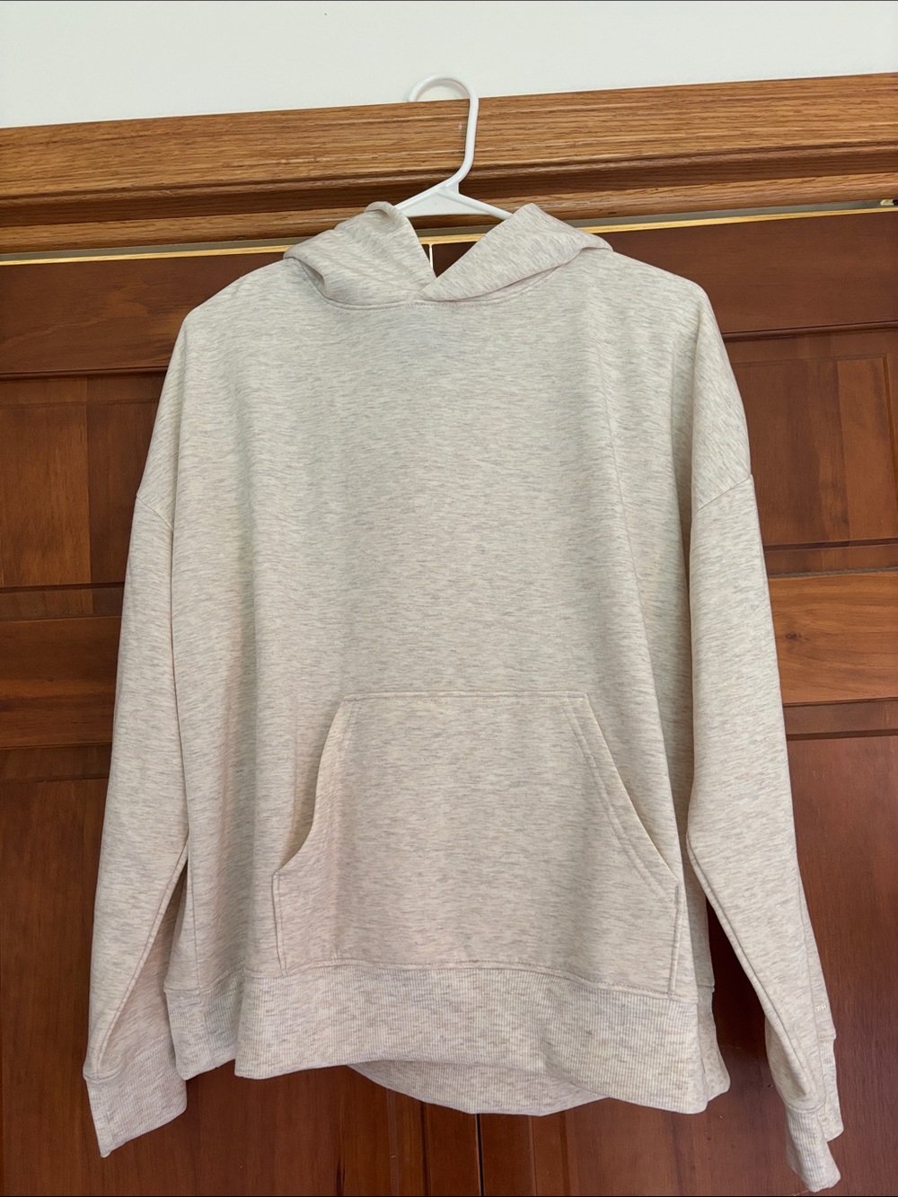Athletic material hoodie. Never worn. Size large fits like medium!